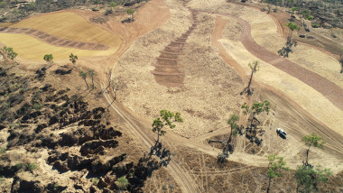 Aerial view of gully rehabilitation works at Strathalbyn Station. Landscape is dry with scattered vegetation.