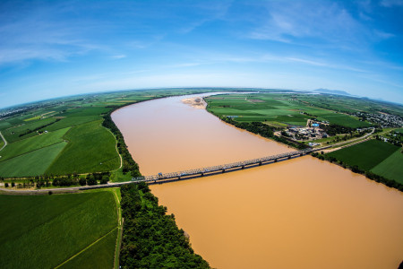 A sediment-laden, full Burdekin river following major rainfall and flooding in the Burdekin catchment in 2019.